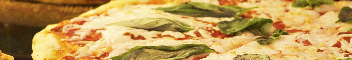 Eating Italian Pizza at Villaggio Ristorante Italian Bistro restaurant in Queens, NY.